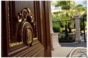 Engraved gold-plated oak door